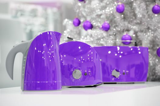 Ultraviolet colored kettle and toasters in appliances store at Christmas