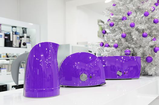 Ultraviolet colored kettle and toasters in appliances store at Christmas