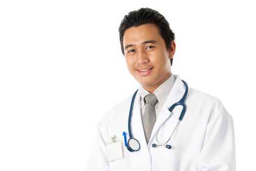 Portrait of attractive young male Southeast Asian medical doctor standing isolated on white background.