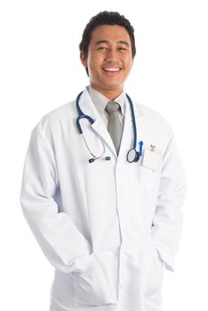 Front view attractive young male Southeast Asian medical doctor standing isolated on white background.