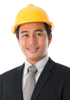Headshot portrait of attractive Southeast Asian engineer with yellow hard hat smiling, standing isolated on white background.
