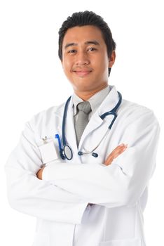 Front view attractive young male Southeast Asian medical doctor arms crossed standing isolated on white background.