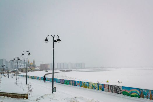 winter promenade snow river snow time and the city