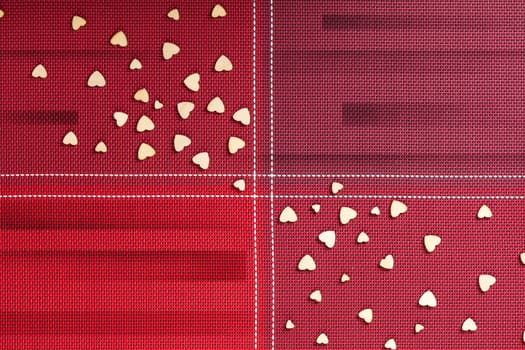 festive background, red napkin with hearts close-up