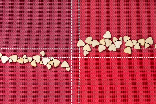 festive background, red napkin with hearts close-up