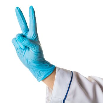 Hand female in blue glove isolated on white showing two fingers.