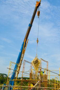 Construction site with crane and workers