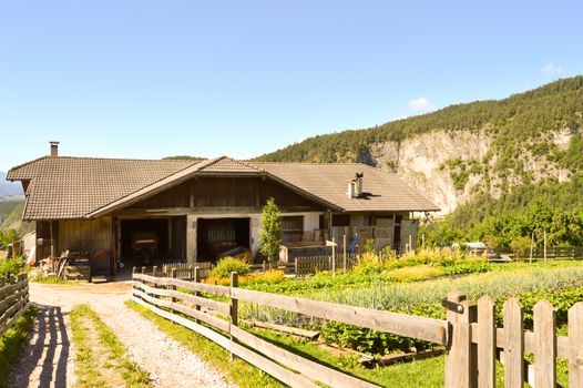 Wooden farmhouse with a vegetable garden in Alto Adige on the South Tyrol in Italy