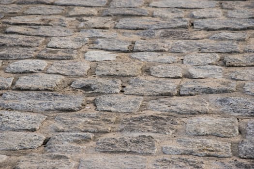 old paving stone, pavement footpath close up photo