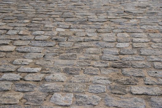 old paving stone, pavement footpath close up photo