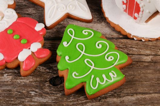 Gingerbread winter Christmas tree on wooden background