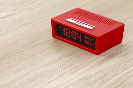 Red alarm clock on wood background