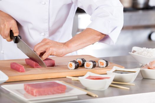 Chef preparing delicious sushi in a restaurant