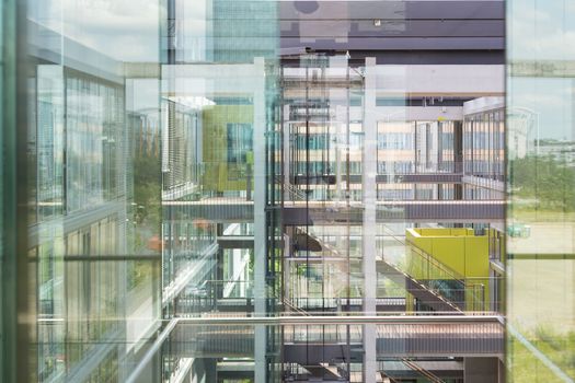 Abstract window reflections in morden office building. Contemporary corporate business architecture.