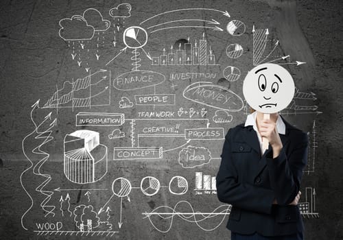 Businesswoman and graphs at background hiding her face behind mask