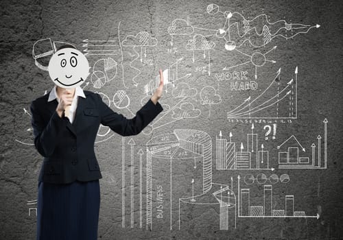Businesswoman and graphs at background hiding her face behind mask