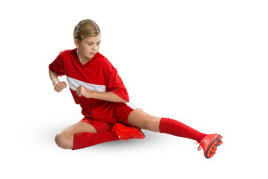 Teenager girl in red uniform isolated on white 