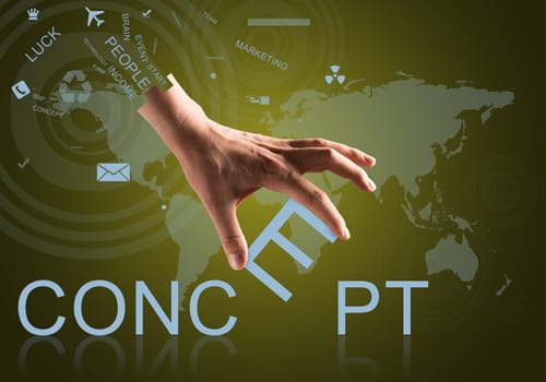 Close up of hand holding one letter of word