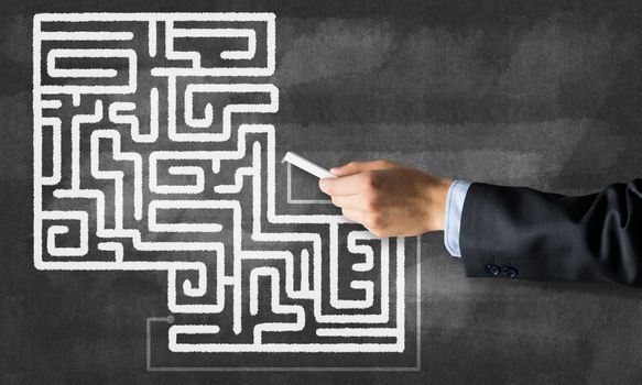 Conceptual image with hand drawning labyrinth pattern