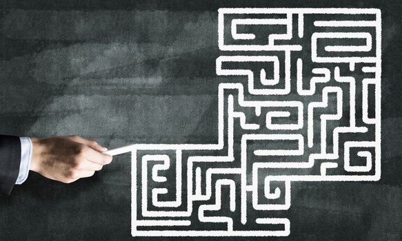 Conceptual image with hand drawning labyrinth pattern