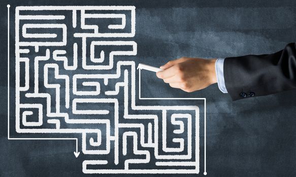 Conceptual image with hand drawning labyrinth pattern