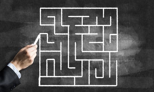 Conceptual image with hand drawning labyrinth pattern