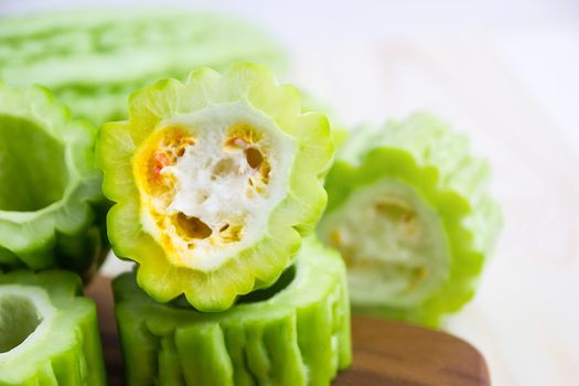 Fresh green bitter cucumber or chinese bitter melon or melon sliced in pieces 