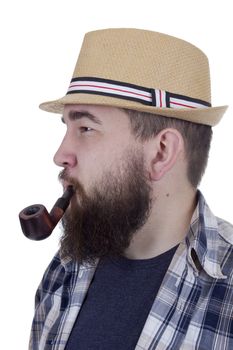 Handsome hipster smocking a pipe on a white background
