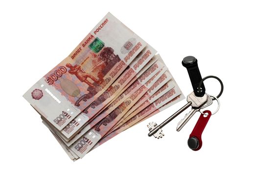 House keys and Russian money against the isolated background. Rental estate.