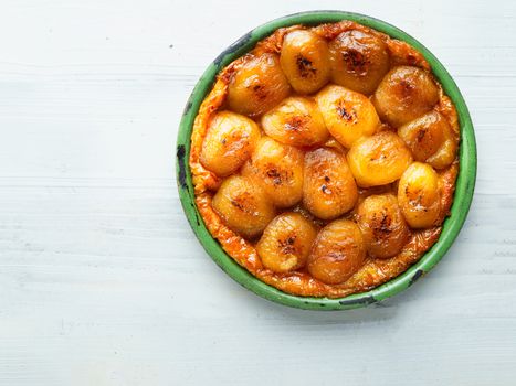 close up of rustic golden french apple tarte tatin