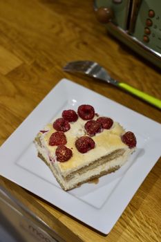 Delicious and fresh home made tiramisu with raspberry. Sweet food concept.