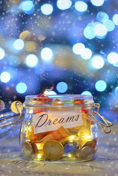 Big dreams saving money jars and lights