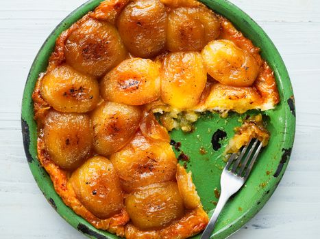 close up of rustic golden apple tarte tatin