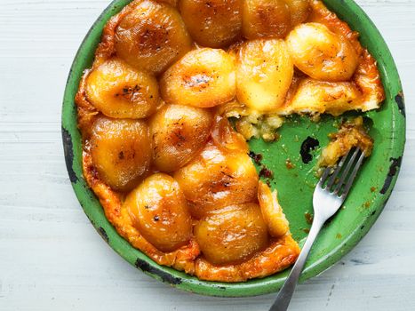 close up of rustic golden apple tarte tatin