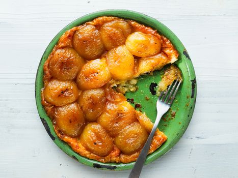 close up of rustic golden apple tarte tatin