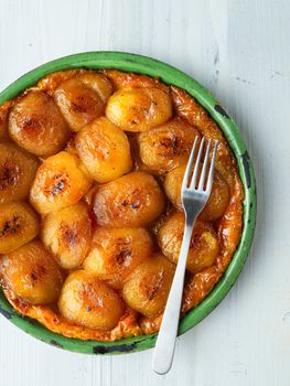 close up of rustic golden apple tarte tatin