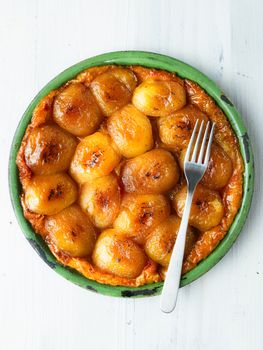 close up of rustic golden apple tarte tatin