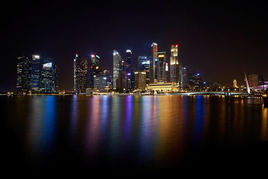 Singapore city skyline at dusk, Marina bay skyline, Singapore.