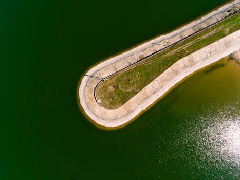 Aerial view breakwater at sea, cutwater, pier, groyne mole