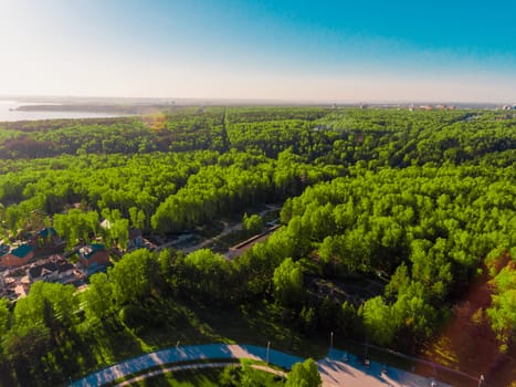 Panorama aerial view shot on a cottage village in a forest, suburb, village, above