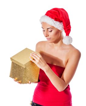 santa girl holding golden gift box and smiling isolated