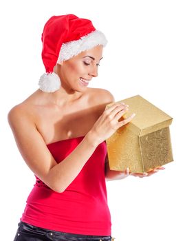 santa girl holding golden gift box and smiling isolated