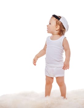 Happy child little boy running isolated over a white