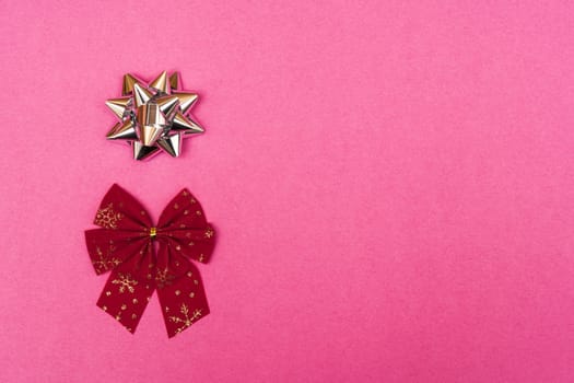 Christmas bows on a colored background