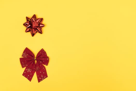 Christmas bows on a colored background