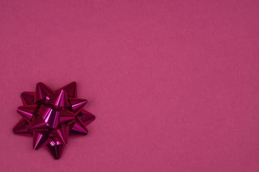 Christmas bows on a colored background