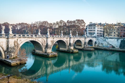 Sant Angelo bridge in Rome at dusk