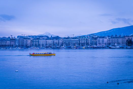 Red and yellow Boat crossing the Geneva lake