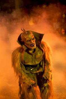 Traditional krampus mask show in Tarvisio, north east of alps, Italy