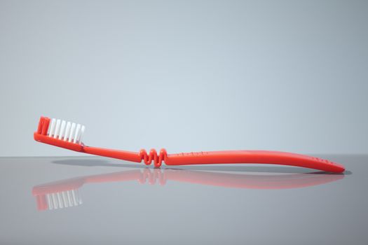 Red toothbrush with reflection, macro shot, Copy space